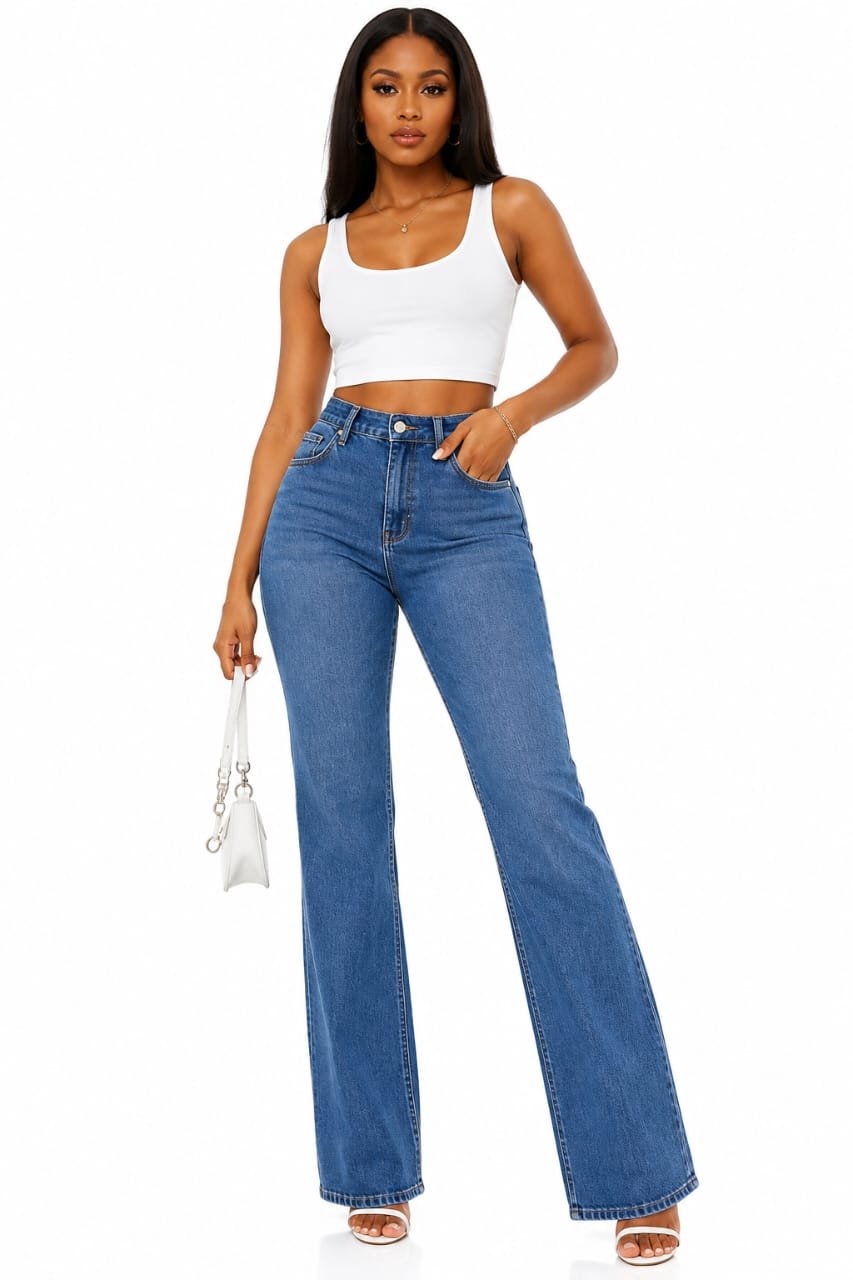 Stylish women's high-waist blue wide-leg baggy jeans paired with a white crop top for casual and trendy fashion in Abuja.